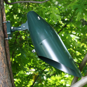 This largest Moonlight bullet kit is as close to having a full moon in your tree as you can get! It's best for use in trees at least 35' tall. The 120V LED Moonlight kit includes the fixture, long shield for glare control, tree mount with all installation hardware, and the 18W LED lamp. Moonlight color temperature is 6500K, so a very cool tone to mimic the moonlight. Add a PAR38 green lens to replicate the old-style "mercury vapor" look, which diffuses the bluer tones and brings out the greens in the tree foliage.